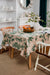 Duk til spisebord og kjøkkenbord med dekorative naturmotiver i grønt